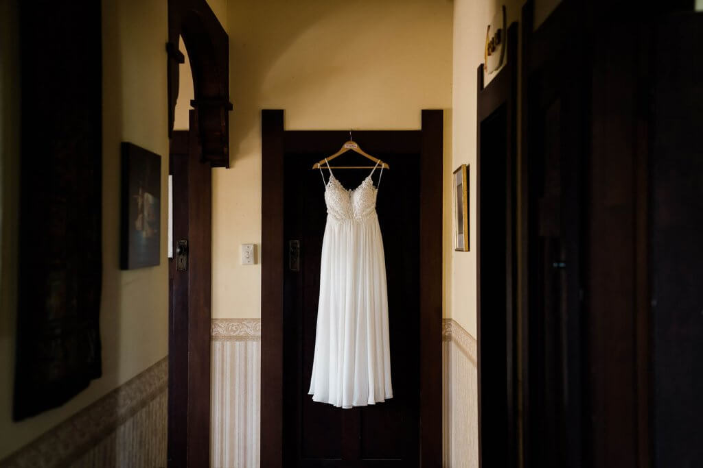 Real Bride Clare wearing her Custom Harriett Falvey Wedding Dress Made in New Zealand