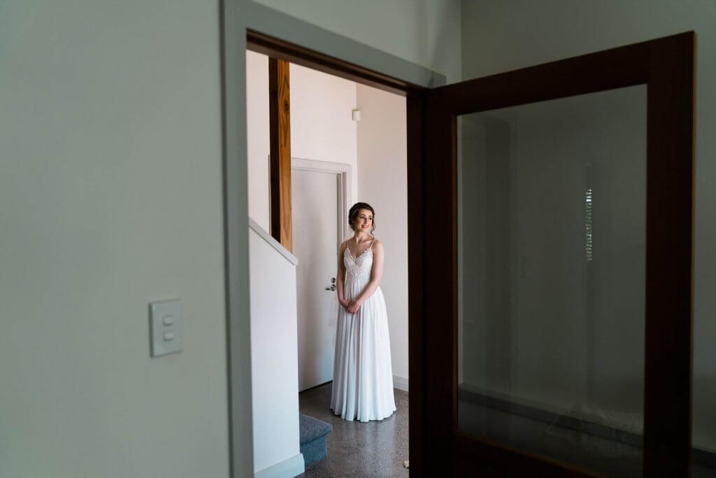 Real Bride Clare wearing her Custom Harriett Falvey Wedding Dress Made in New Zealand