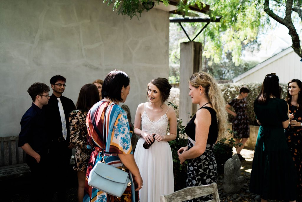 Real Bride Clare wearing her Custom Harriett Falvey Wedding Dress Made in New Zealand