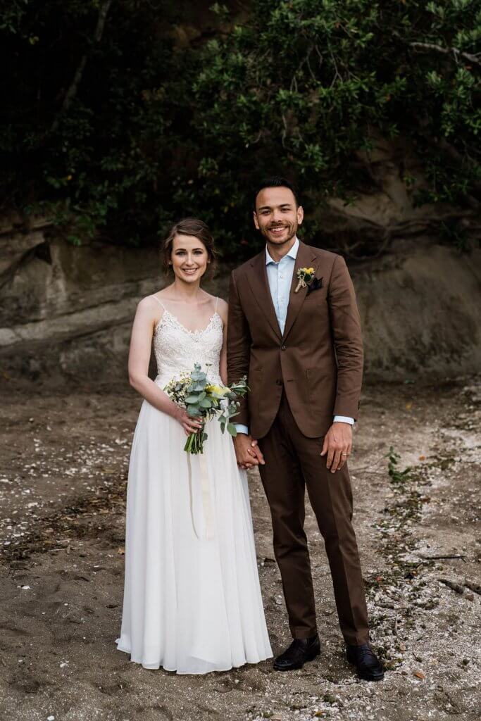 Real Bride Clare wearing her Custom Harriett Falvey Wedding Dress Made in New Zealand