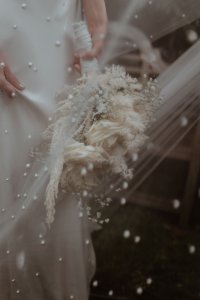 This wedding veil is made using the softest ivory tulle. Scattered with two different sized pearls