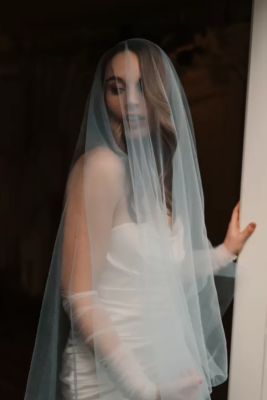 Model Styling the Blue Blusher Veil designed by Harriett Falvey, New Zealand Bridal Designer