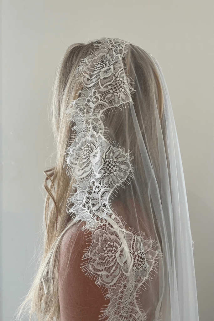 Elevate your bridal look with our exquisite Lace Wedding Veil. Are you looking for an antique vintage inspired wedding veil or a bohemian lace veil vibe, our scolloped edged veil is the perfect accessory to complete your bridal ensemble. Worn as a mantilla lace veil style or ask for the option to make this veil with a blusher?