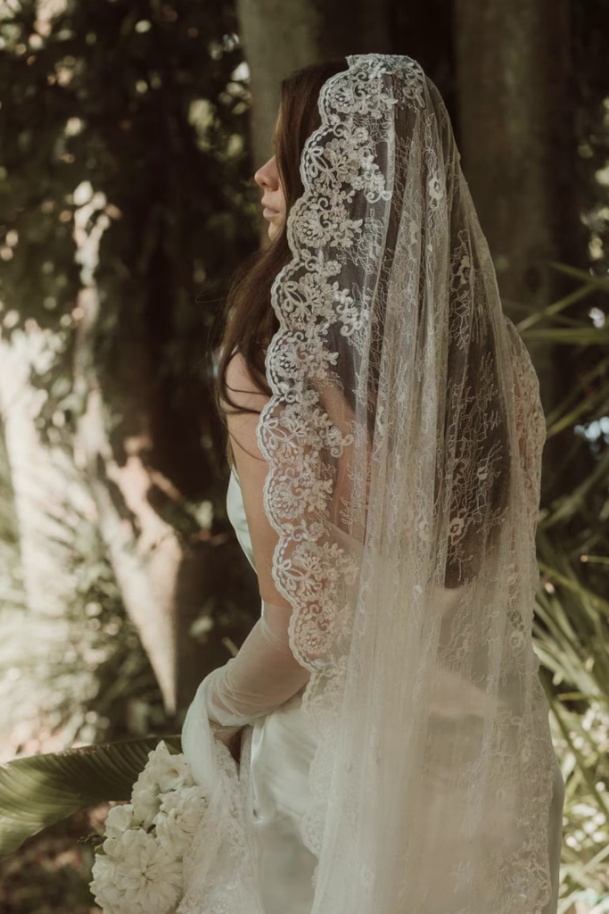 Model Styling the Chantilly Lace of Lace Veil designed by Harriett Falvey, New Zealand Bridal Designer