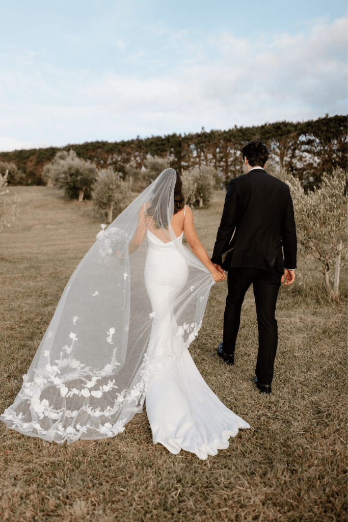 Real Bride Erin wearing a Harriett Falvey Embellished Lace Veil. Shot by Hollow and Co