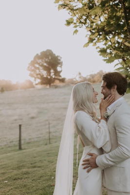 Real Bride Ashlee wearing the Pearl Trim Mantilla Veil by Harriett Falvey, New Zealand Bridal Designer. Photography by @white_shutter_photography