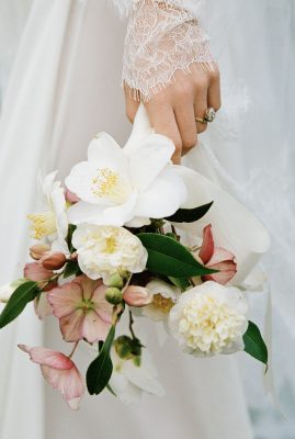 A styled bridal shoot by Harriett Falvey, photographed by Ana Galloway, including lace veils, blusher veils, tulle scarves, lace gloves, pearl veils, mantilla veils and much more in Auckland Domain, New Zealand