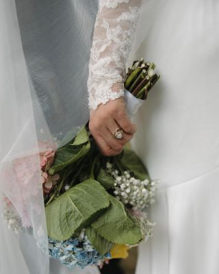 Real Bride Sara wearing a custom Harriett Falvey lace gloves. Photographed by @meganhayniephoto To see more head to our website