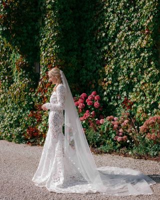 Real Bride Elizabeth wearing a custom Harriett Falvey tulle flower wedding veil. Photographed by @storiesfromeros To see more head to our website