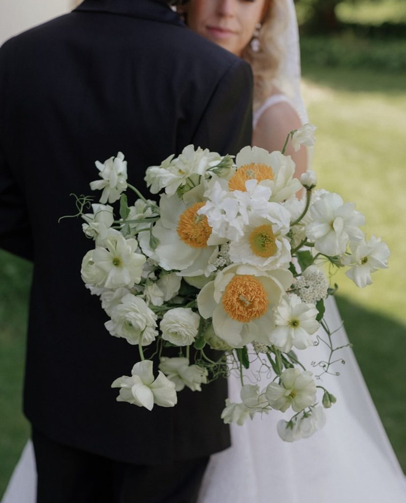 Real Bride Hanna wearing a custom lace edge mantilla veil by Harriett Falvey | Custom Bridal Designer