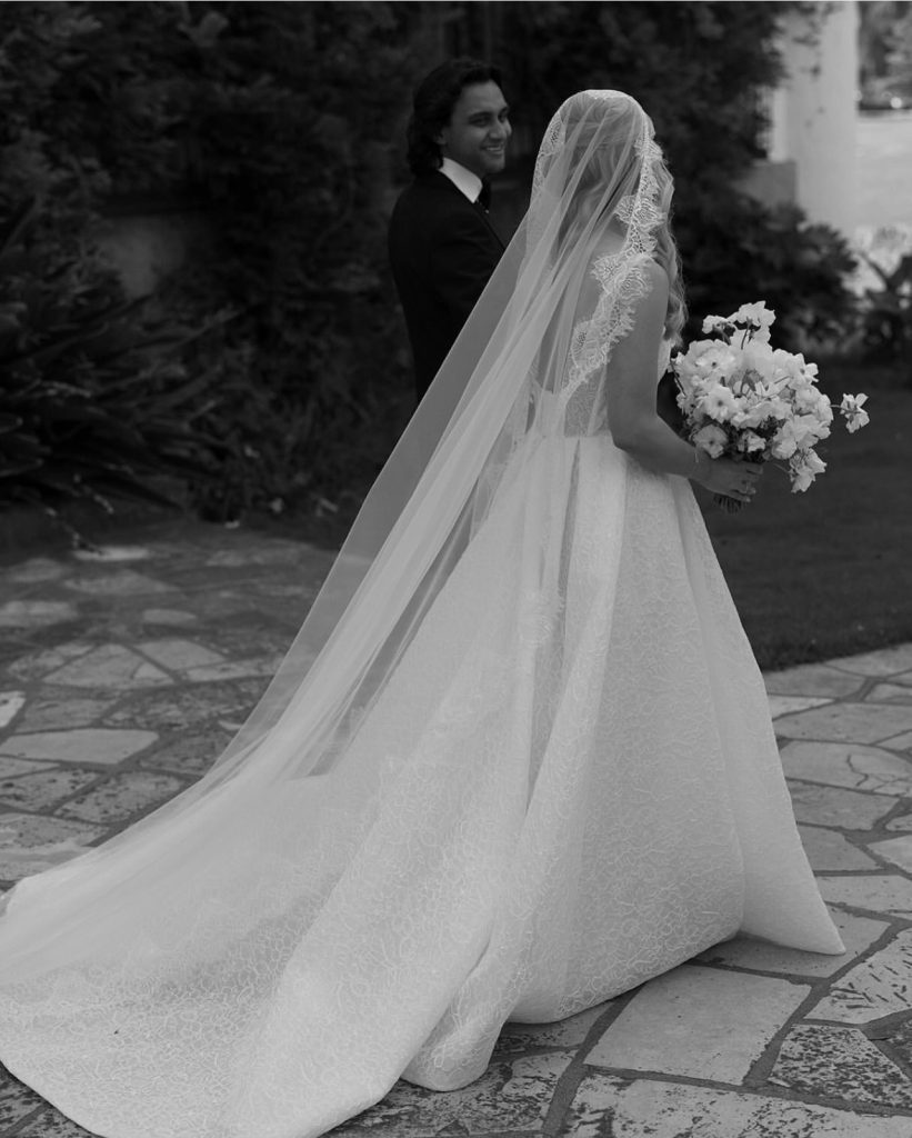 Real Bride Hanna wearing a custom lace edge mantilla veil by Harriett Falvey | Custom Bridal Designer