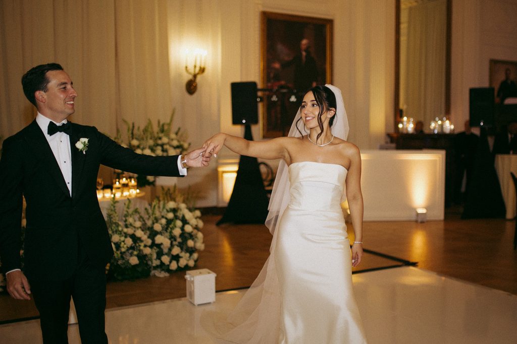 Real Bride Sara wearing her custom tulle blusher veil by Harriett Falvey | Custom Bridal Designer