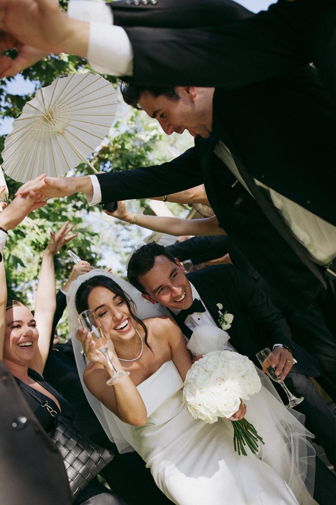 Real Bride Sara wearing her custom tulle blusher veil by Harriett Falvey | Custom Bridal Designer