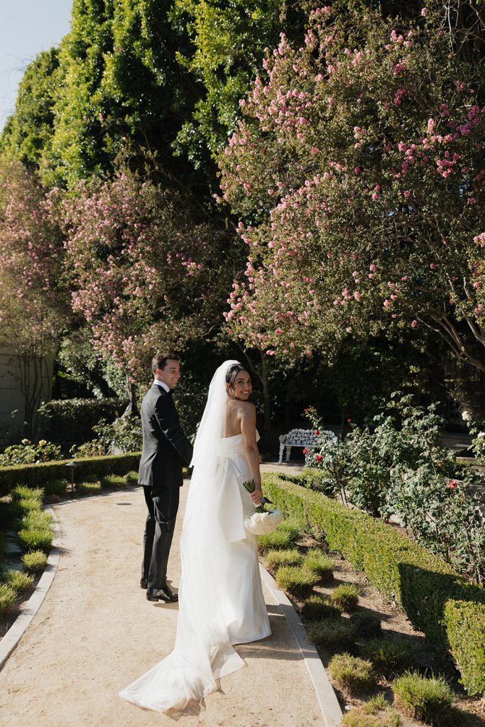 Real Bride Sara wearing her custom tulle blusher veil by Harriett Falvey | Custom Bridal Designer