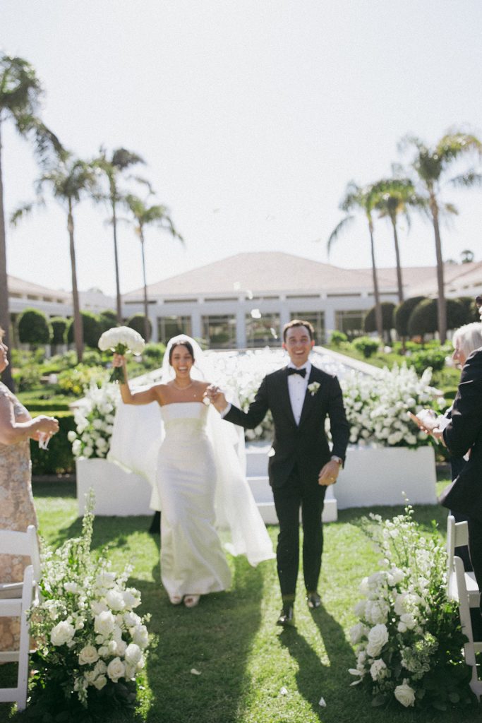 Real Bride Sara wearing her custom tulle blusher veil by Harriett Falvey | Custom Bridal Designer