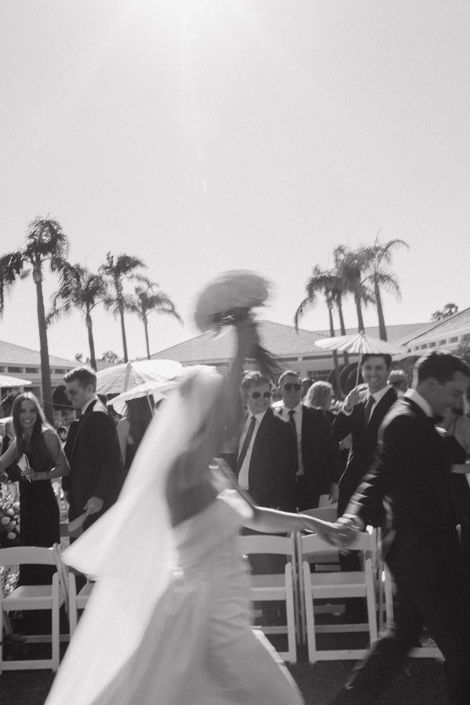 Real Bride Sara wearing her custom tulle blusher veil by Harriett Falvey | Custom Bridal Designer