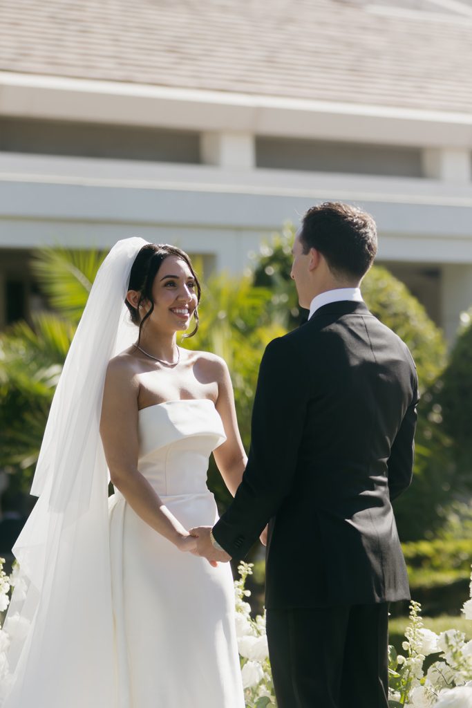 Real Bride Sara wearing her custom tulle blusher veil by Harriett Falvey | Custom Bridal Designer