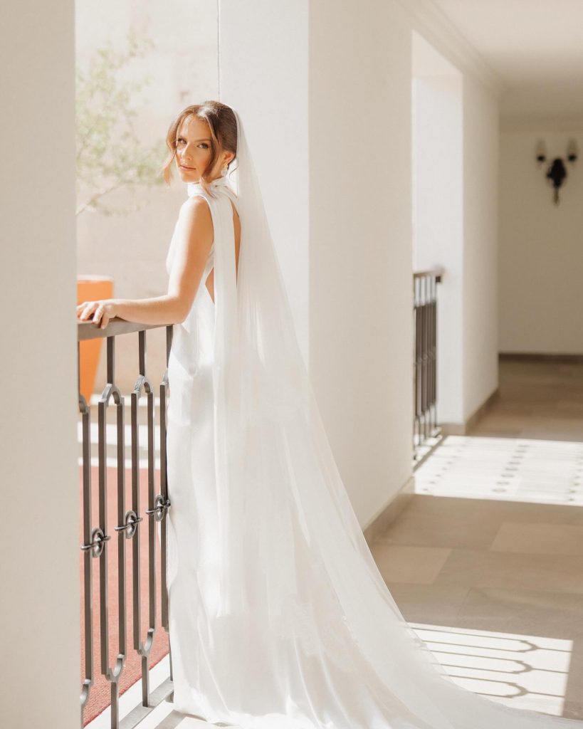 Real Bride Olivia wearing her custom Harriett Falvey Lace edged blusher veil to her wedding in Mexico