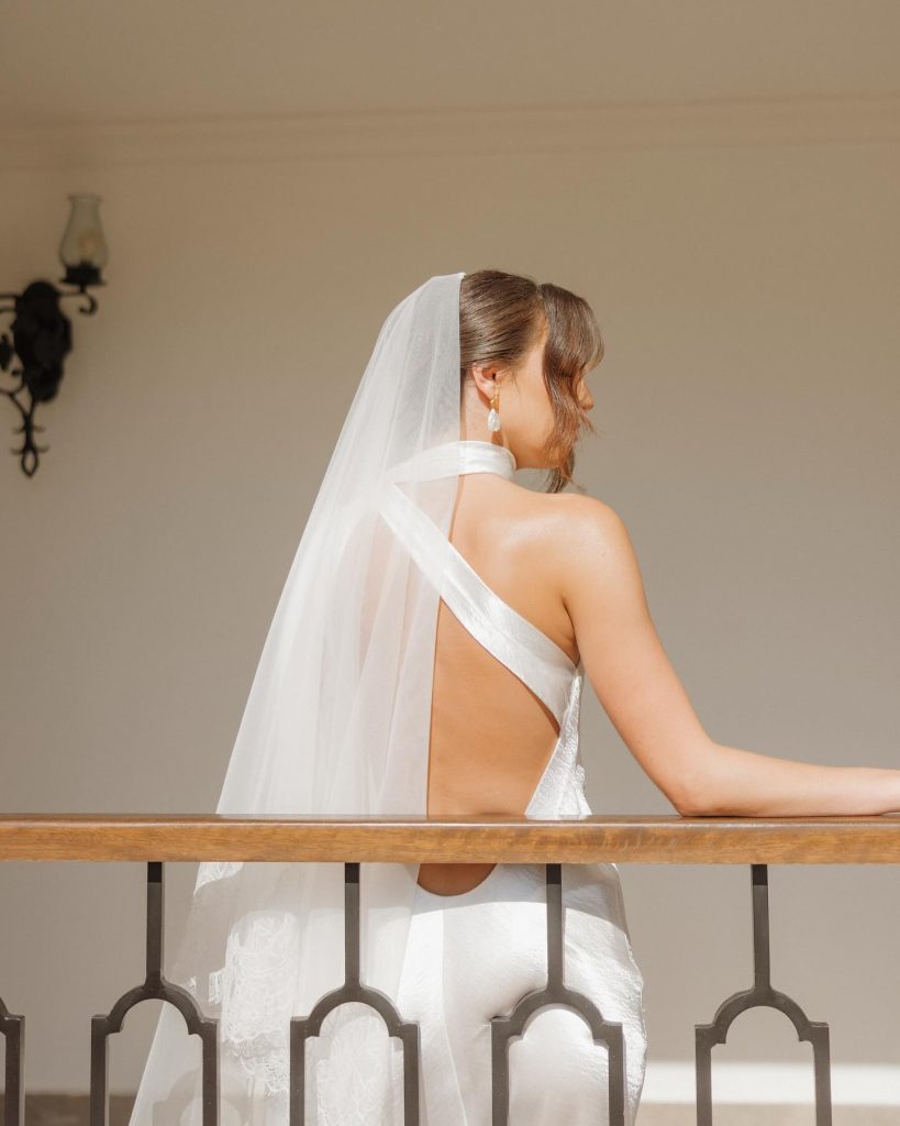 Real Bride Olivia wearing her custom Harriett Falvey Lace edged blusher veil to her wedding in Mexico