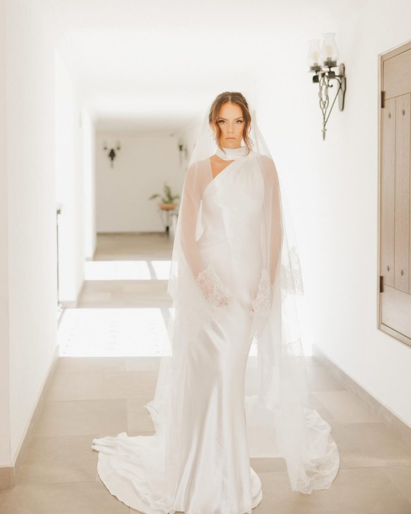 Real Bride Olivia wearing her custom Harriett Falvey Lace edged blusher veil to her wedding in Mexico