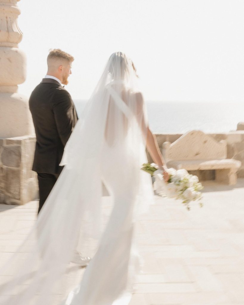 Real Bride Olivia wearing her custom Harriett Falvey Lace edged blusher veil to her wedding in Mexico