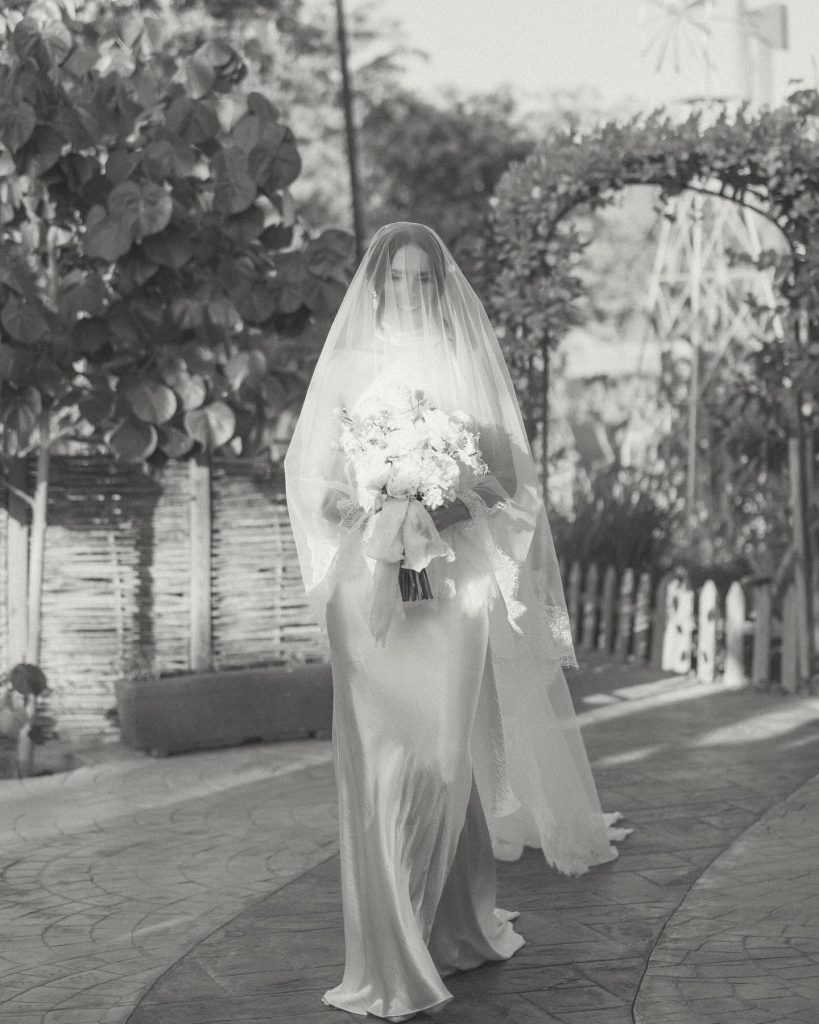 Real Bride Olivia wearing her custom Harriett Falvey Lace edged blusher veil to her wedding in Mexico