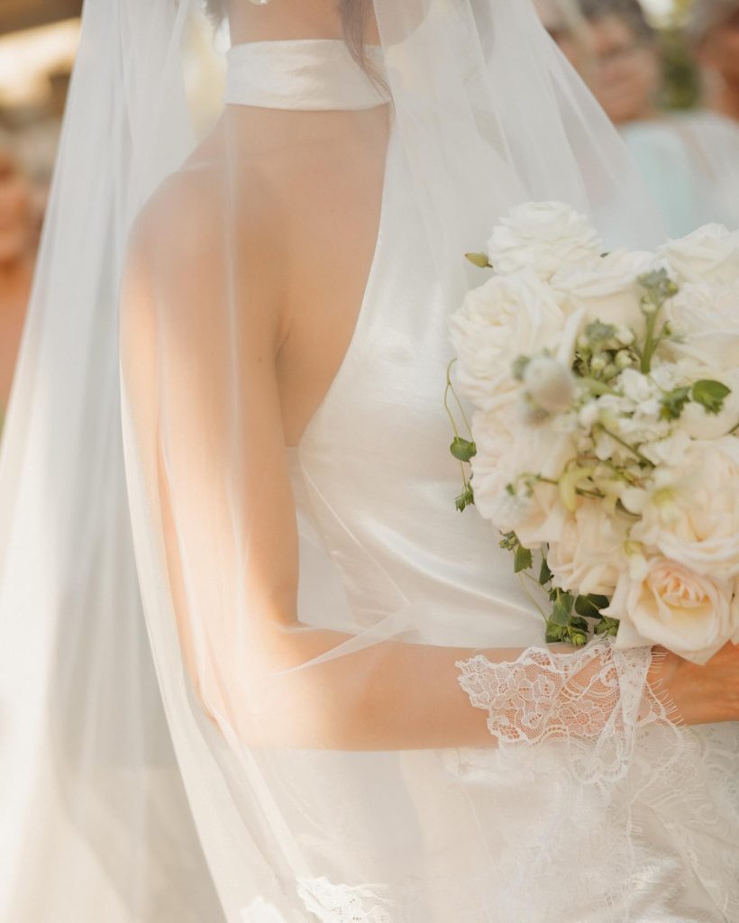 Real Bride Olivia wearing her custom Harriett Falvey Lace edged blusher veil to her wedding in Mexico