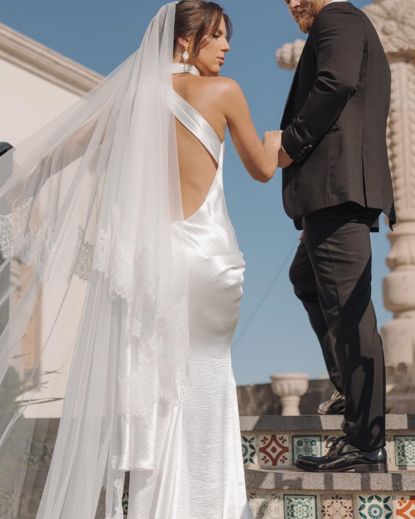 Real Bride Olivia wearing her custom Harriett Falvey Lace edged blusher veil to her wedding in Mexico