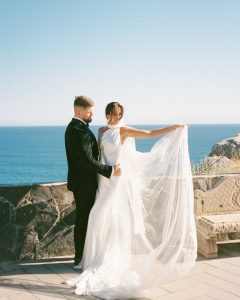 Real Bride Olivia wearing her custom Harriett Falvey Lace edged blusher veil to her wedding in Mexico