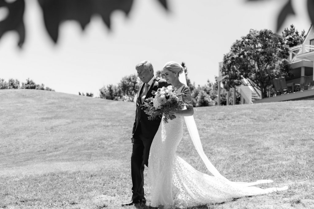 Real Bride Tammy wearing her Custom Harriett Falvey Wedding Dress and Veil Made in New Zealand