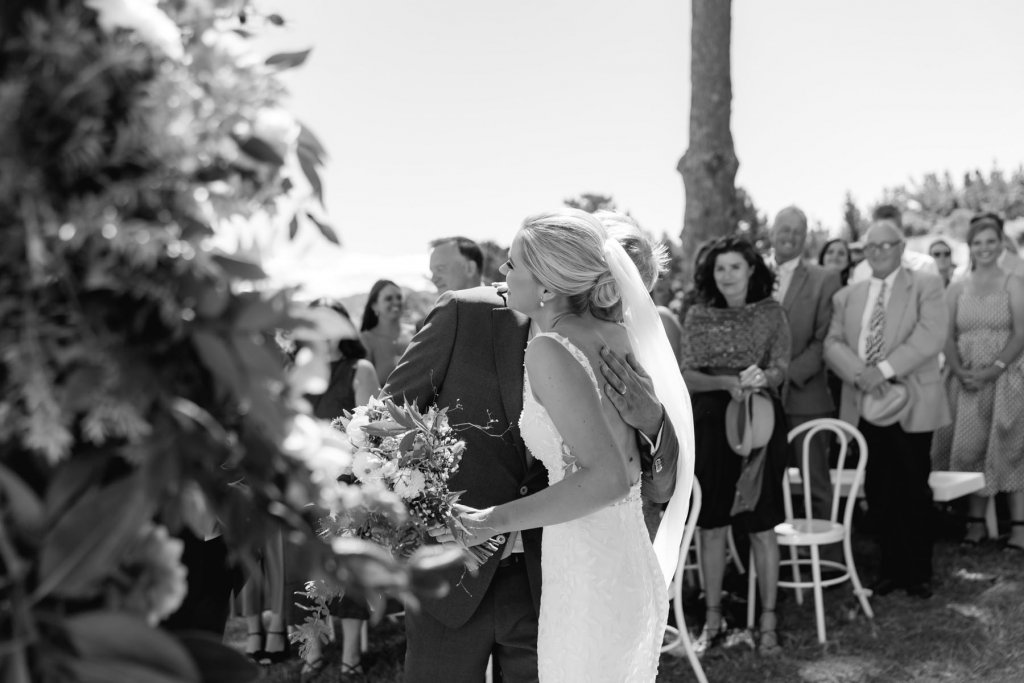 Real Bride Tammy wearing her Custom Harriett Falvey Wedding Dress and Veil Made in New Zealand