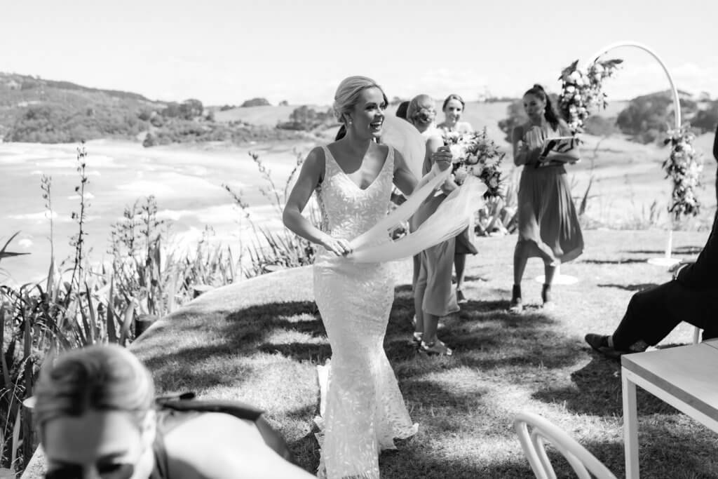 Real Bride Tammy wearing her Custom Harriett Falvey Wedding Dress and Veil Made in New Zealand