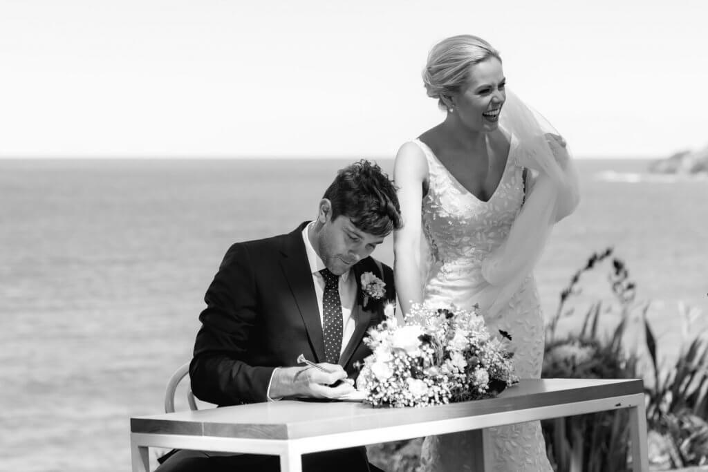 Real Bride Tammy wearing her Custom Harriett Falvey Wedding Dress and Veil Made in New Zealand