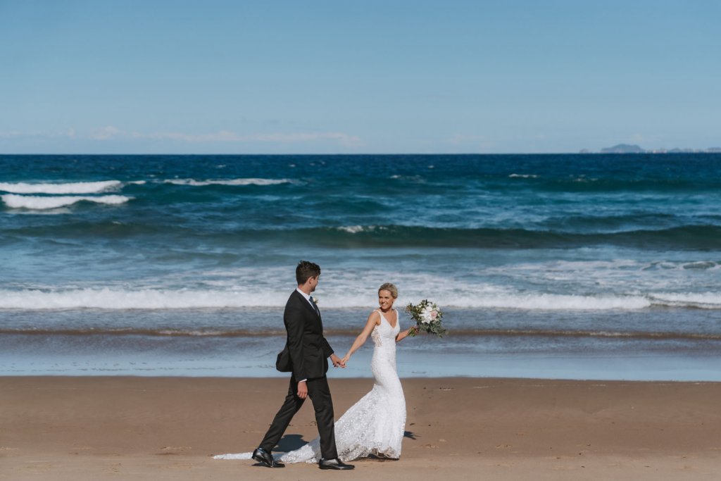 Real Bride Tammy wearing her Custom Harriett Falvey Wedding Dress and Veil Made in New Zealand