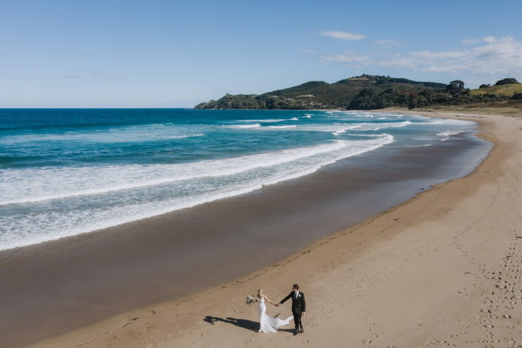 Real Bride Tammy wearing her Custom Harriett Falvey Wedding Dress and Veil Made in New Zealand