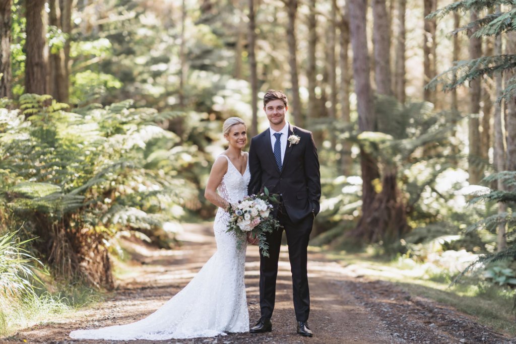 Real Bride Tammy wearing her Custom Harriett Falvey Wedding Dress and Veil Made in New Zealand