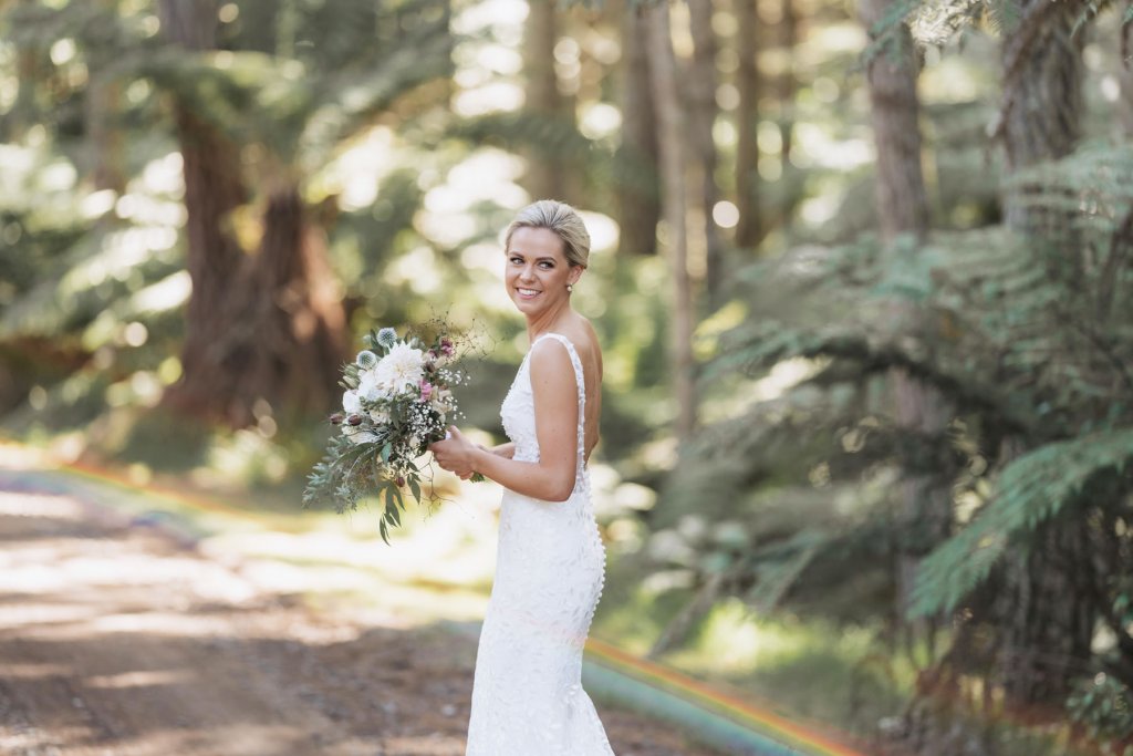 Real Bride Tammy wearing her Custom Harriett Falvey Wedding Dress and Veil Made in New Zealand